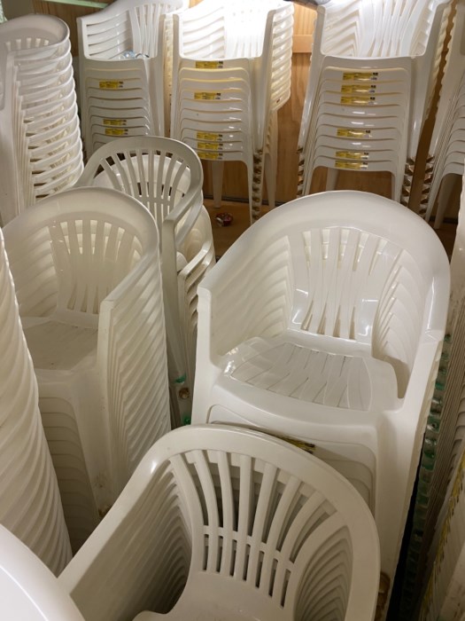 Lot of Approximately (400) Plastic Lawn Chairs for sale