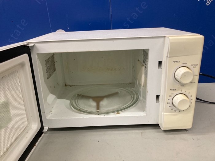 Sold at Auction: Sunbeam Small Counter Microwave